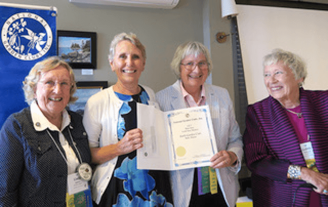 BGC members receiving award at GCFM meeting